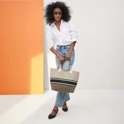 Rothy's The Lightweight Tote - Jetset Black -Rothy's Shoes Store 086 LightweightTote JetsetStripe OnFigure 1489 fd18e529 8654 4c61 9065 404f5a16d40c