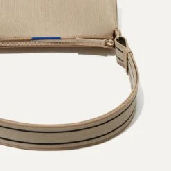 Rothy's The Casual Crossbody - Parchment 16 Rothy's The Casual Crossbody - Parchment -Rothy's Shoes Store 142 CasualCrossbody Parchment Strap8473