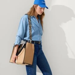 Rothy's The Crossbody Strap - Desert Cat -Rothy's Shoes Store 162 ClassicTote GrandPiano On Figure 0945